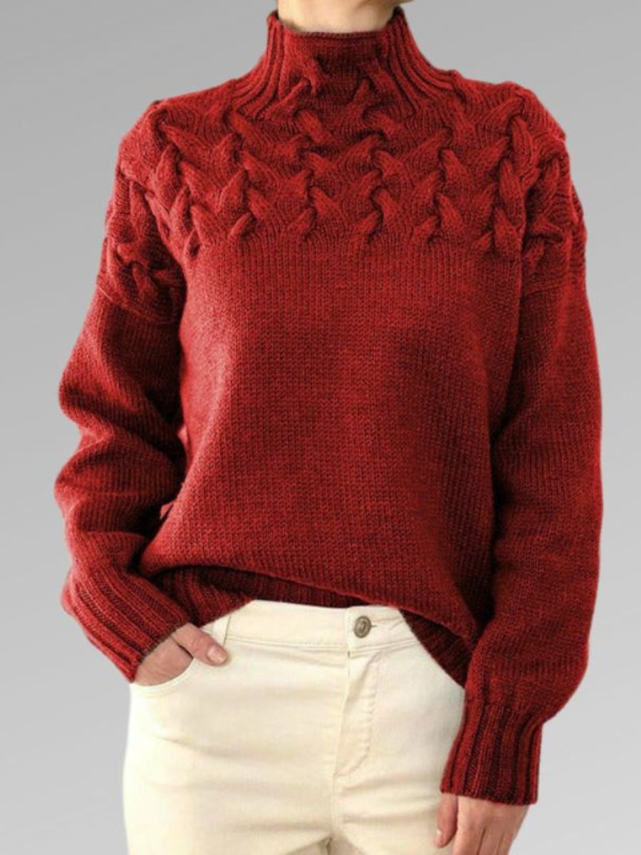 Elegant kabelstrikket sweater