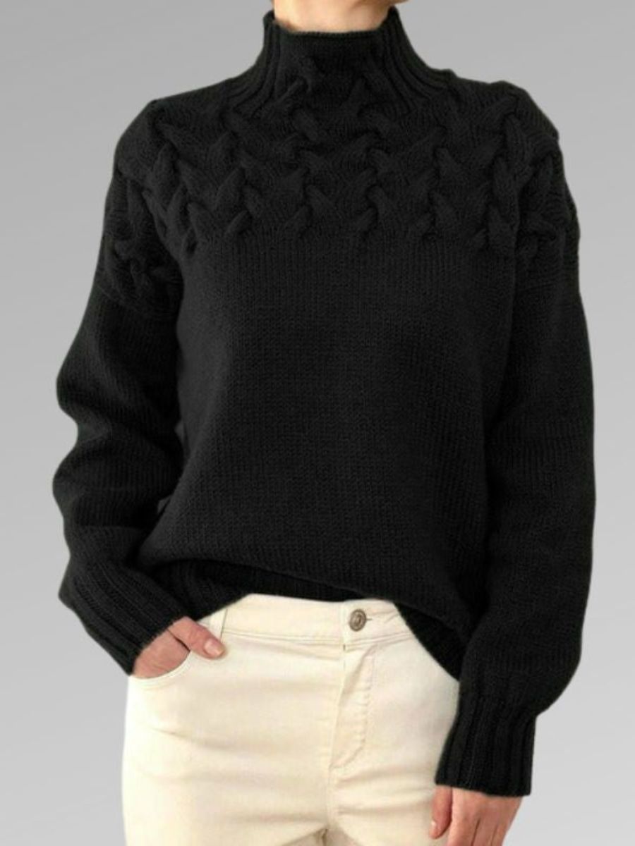 Elegant kabelstrikket sweater