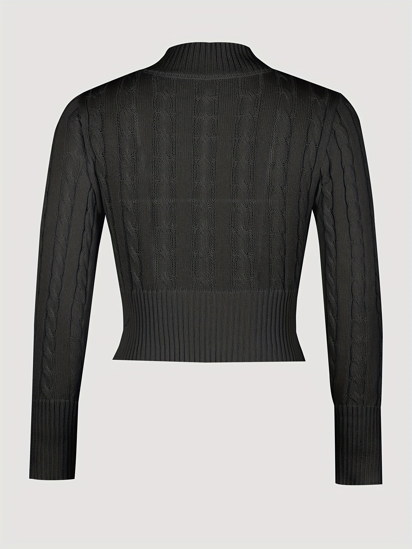 Slank cropped sweater med snoet mønster