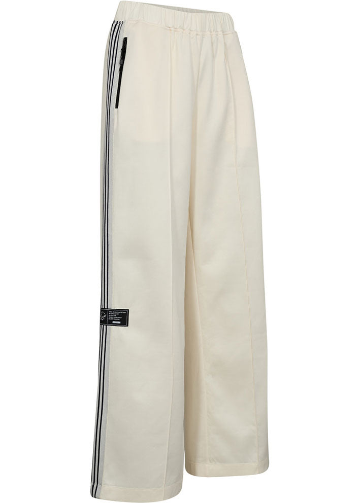 Haute L'amitié Baggy Track Pants - Off-white