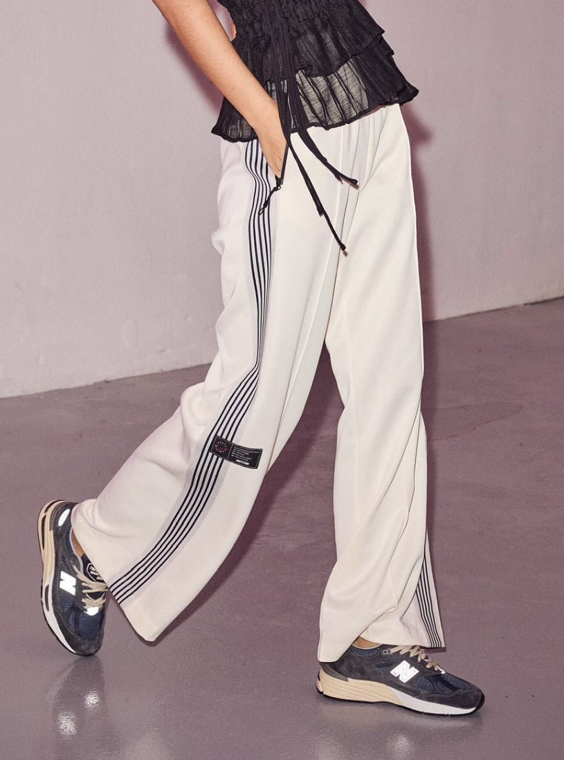 Haute L'amitié Baggy Track Pants - Off-white
